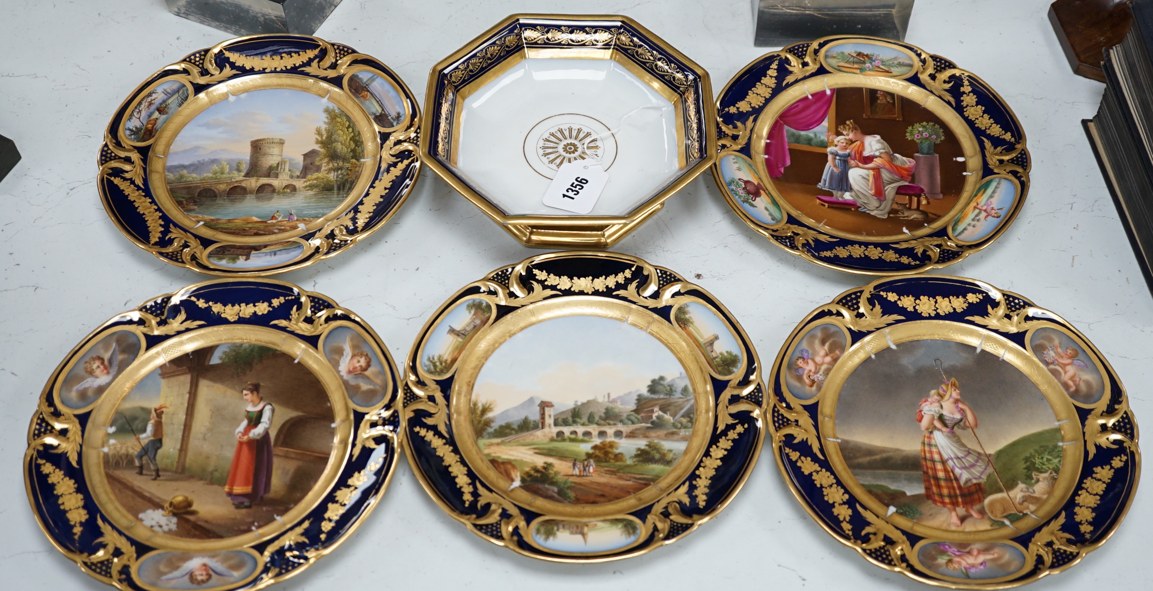 A group of 19th century Paris porcelain painted cabinet plates together with an associated footed bowl (group), plates 24cms diameter